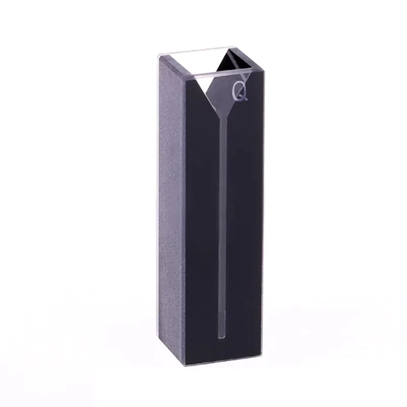 Black UV quartz cuvette in laboratory setting with UV spectrophotometer equipment